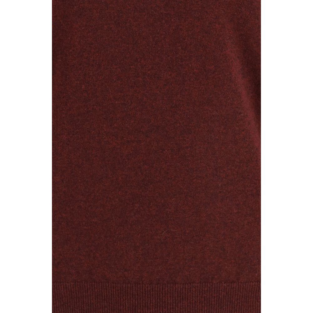 Indulge in the Brunello Cucinelli Bordeaux Cashmere Sweater, a masterpiece of luxurious cashmere, designed for those who appreciate timeless elegance and exquisite craftsmanship.