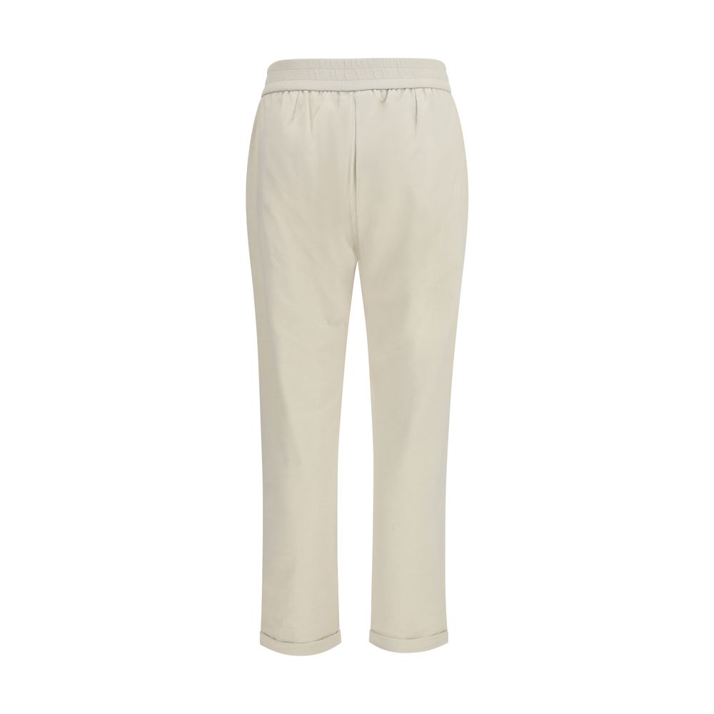 Experience the allure of Brunello Cucinelli Beige Cotton Joggers, crafted from luxurious stretch-fleece for effortless elegance and comfort in every moment.