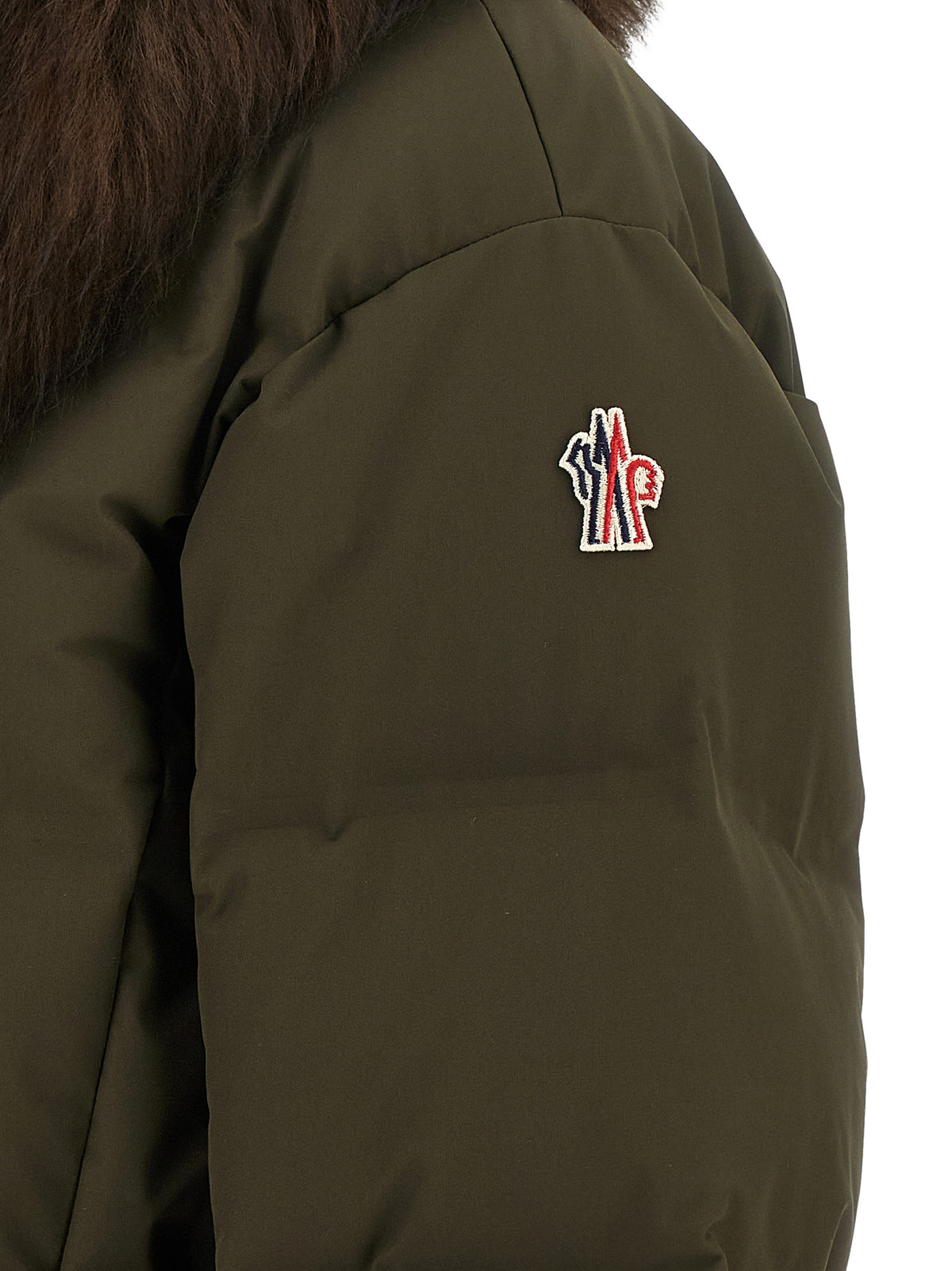 Indulge in the Moncler Grenoble Bicolor Polyester Full-Length Jacket, where exquisite boudin quilting meets opulent design, embodying winter elegance and sophistication.