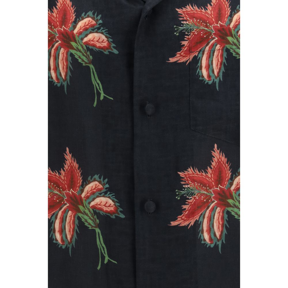 Elevate your wardrobe with the Valentino Garavani Black Linen Pattern Shirt, crafted from 100% linen and adorned with an iconic floral print, embodying effortless luxury and sophistication.