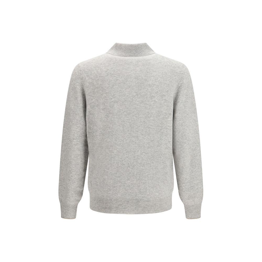 Experience the refined elegance of the Brunello Cucinelli Gray Cashmere Polo Shirt, crafted from pure cashmere for a luxurious touch that transcends occasions.