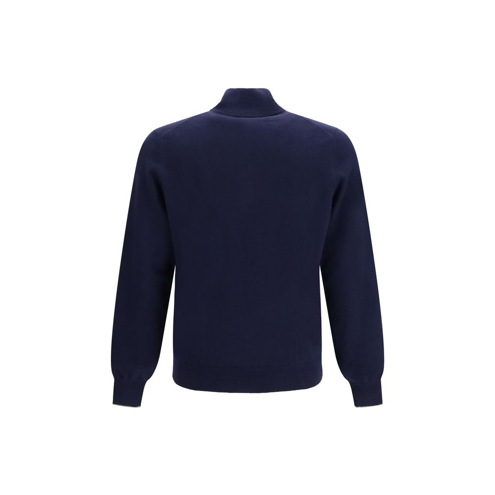 Elevate your wardrobe with the Brunello Cucinelli Blue Cashmere Sweater, a masterpiece of luxurious craftsmanship and timeless elegance, perfect for discerning individuals.
