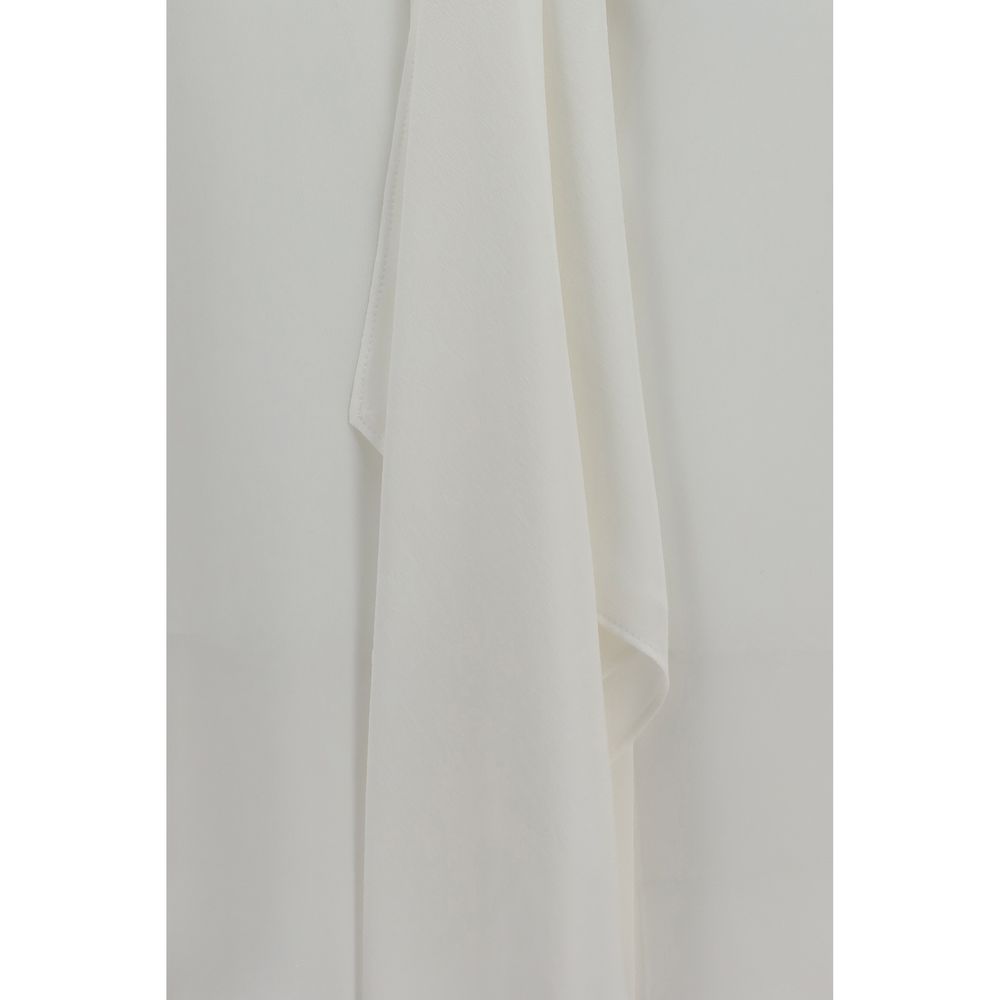 Elevate your wardrobe with the Brunello Cucinelli White Silk Dress Shirt, a masterpiece of pure silk craftsmanship, embodying timeless elegance and sophistication for discerning tastes.