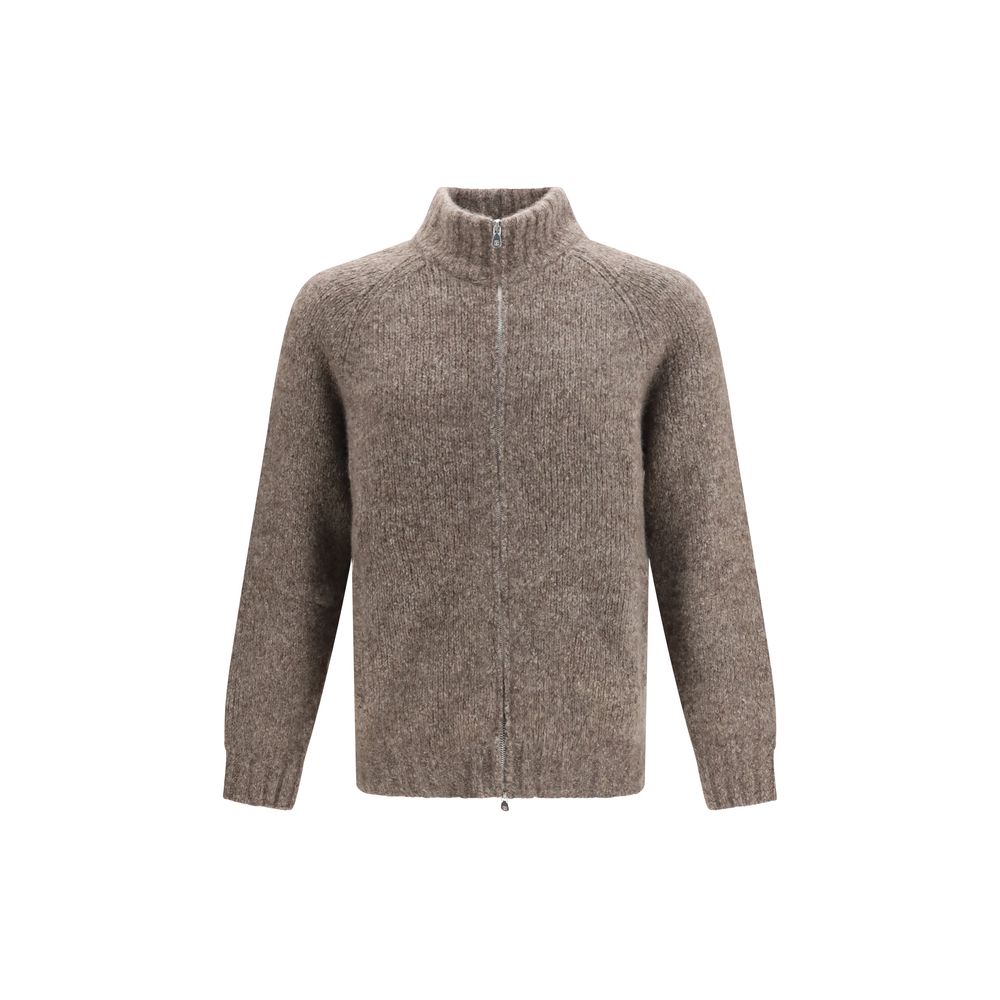 Experience the exquisite allure of the Brunello Cucinelli Beige Cashmere Cardigan, a luxurious blend of cashmere and silk, embodying timeless elegance and refined sophistication.