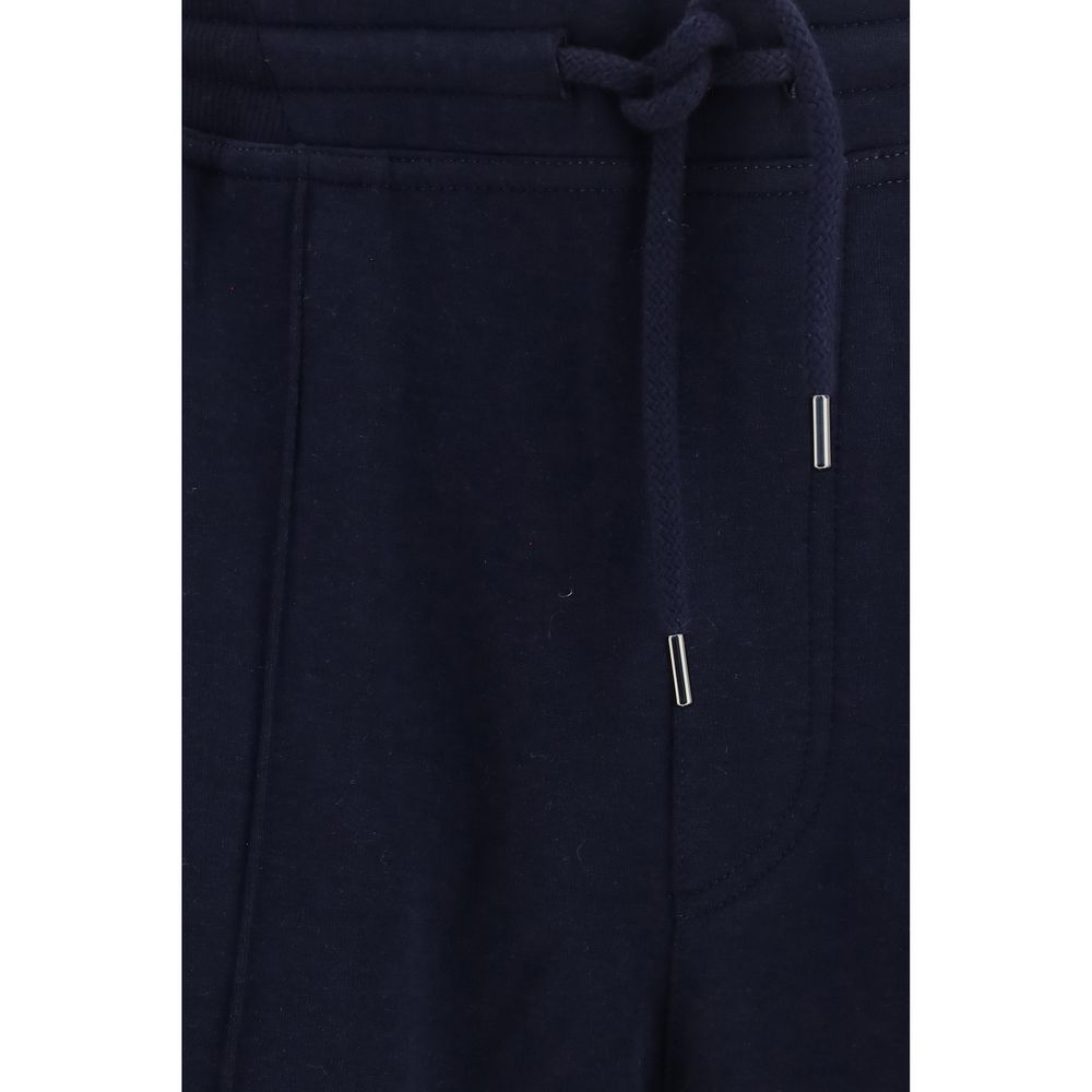 Elevate your wardrobe with Brunello Cucinelli's Blue Cotton Athletic Pants, where luxurious materials meet tailored craftsmanship for a sophisticated, versatile style.