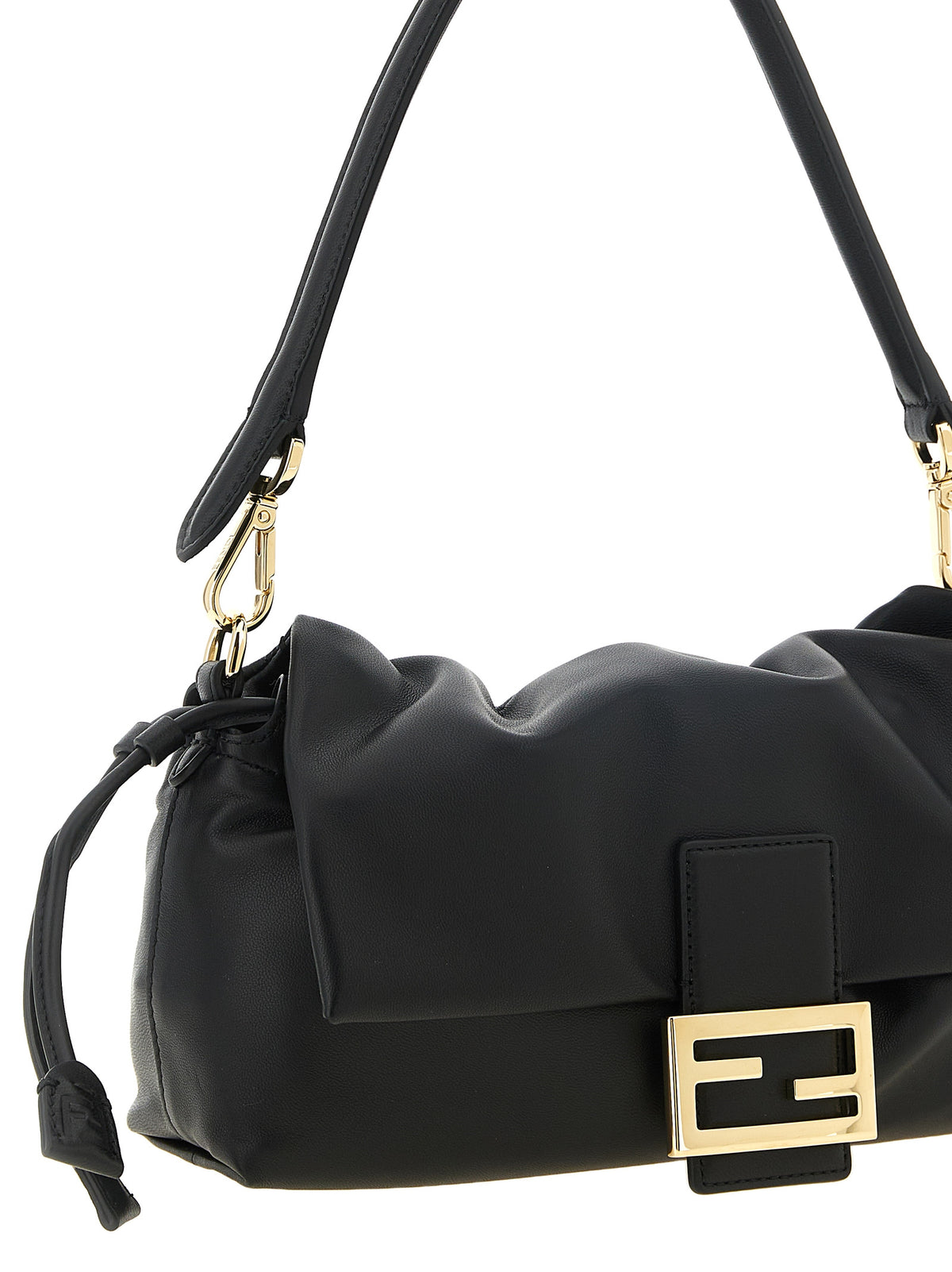 Indulge in the Fendi Baguette® Soft Media handbag, a masterpiece of black nappa leather, exuding timeless elegance and unparalleled craftsmanship for the discerning individual.