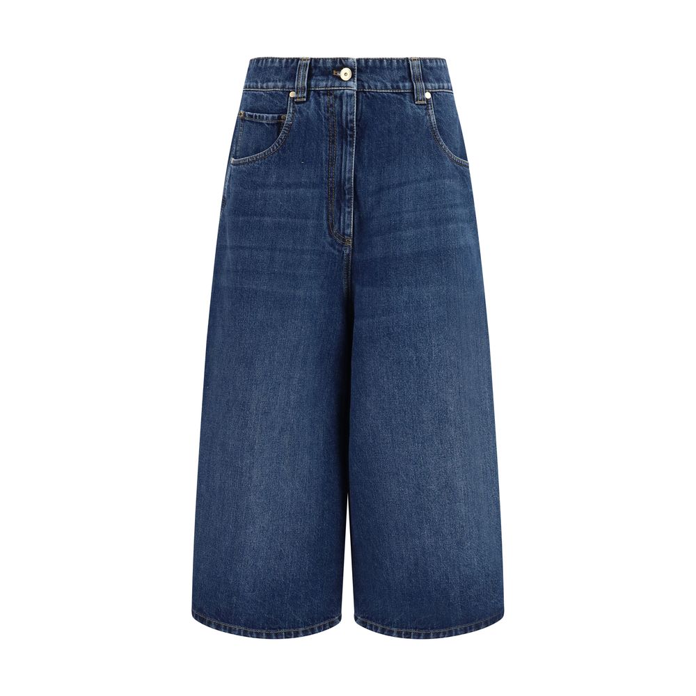 Discover the allure of Brunello Cucinelli Blue Denim Shorts, crafted from pure cotton with a sophisticated washed finish, embodying timeless elegance for the discerning individual.