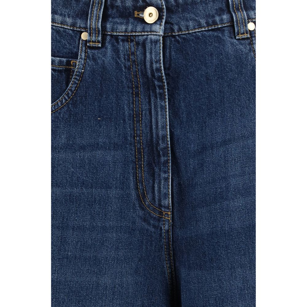 Indulge in the exquisite Brunello Cucinelli Blue Denim Shorts, crafted from pure cotton with a sophisticated washed finish, embodying timeless elegance and luxury.