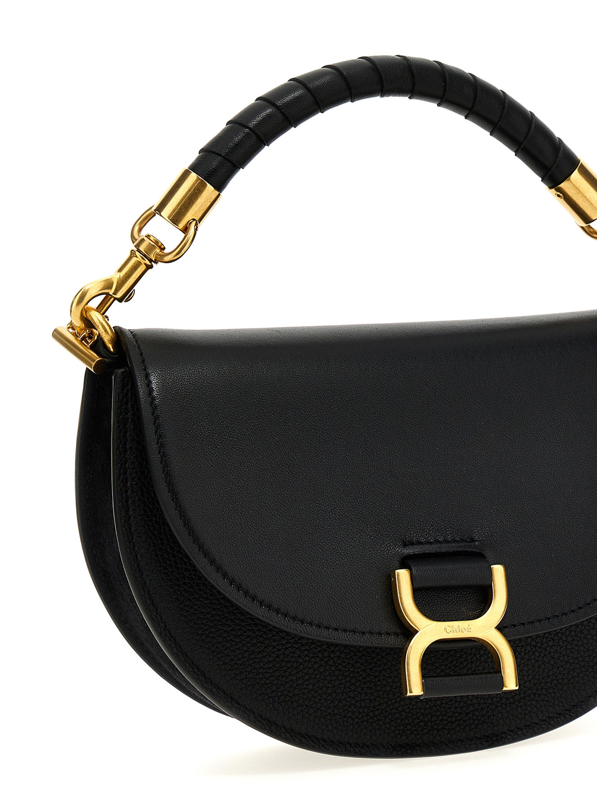 Discover the Chloé Black Calfskin Handbag, a masterpiece of Italian craftsmanship that embodies timeless elegance and sophistication for the discerning individual.