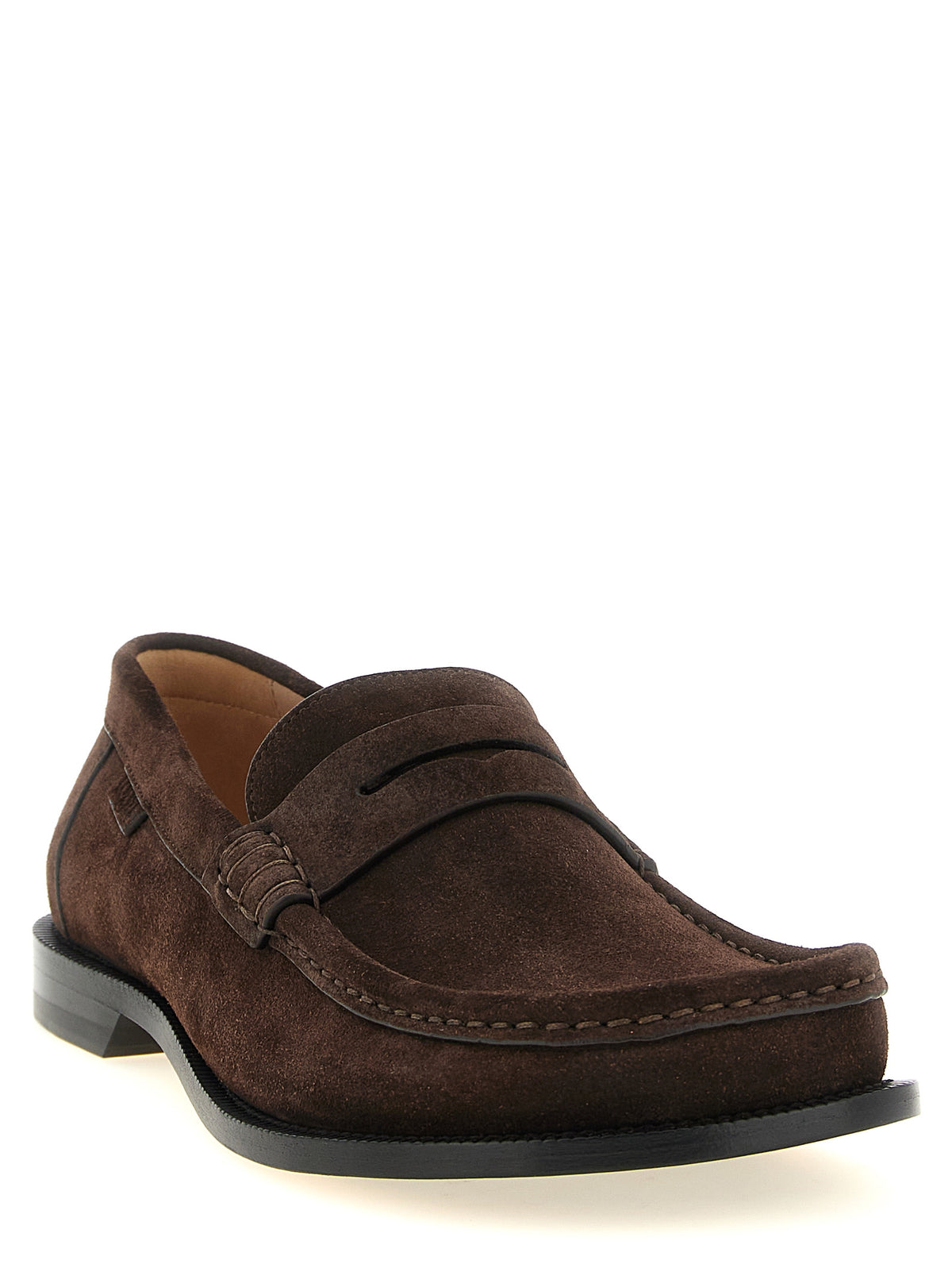 Elevate your style with Loewe's Brown Calfskin Slip-On Loafers, crafted from exquisite calfskin leather in Italy, embodying timeless elegance and unparalleled luxury.