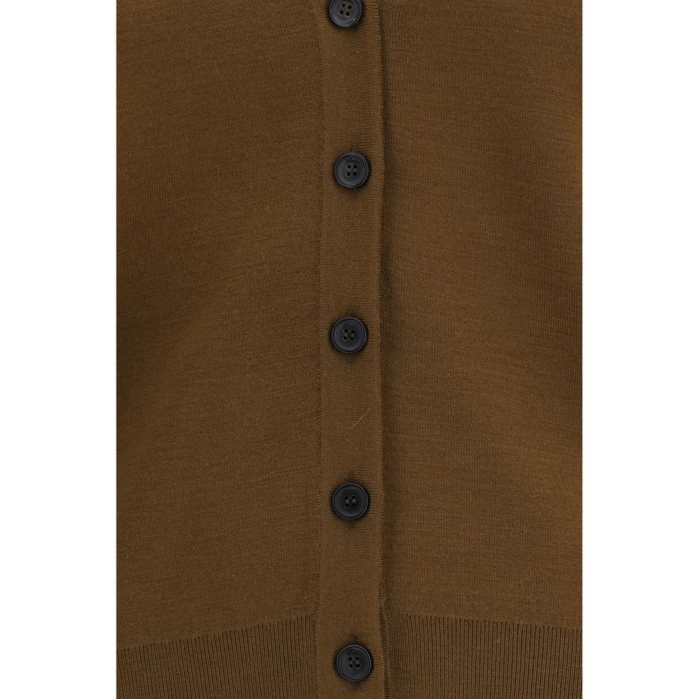 Indulge in the Khaite Brown Wool Oves Aries Cardigan, crafted from 100% fleece wool for a luxurious embrace, embodying effortless elegance and timeless sophistication.