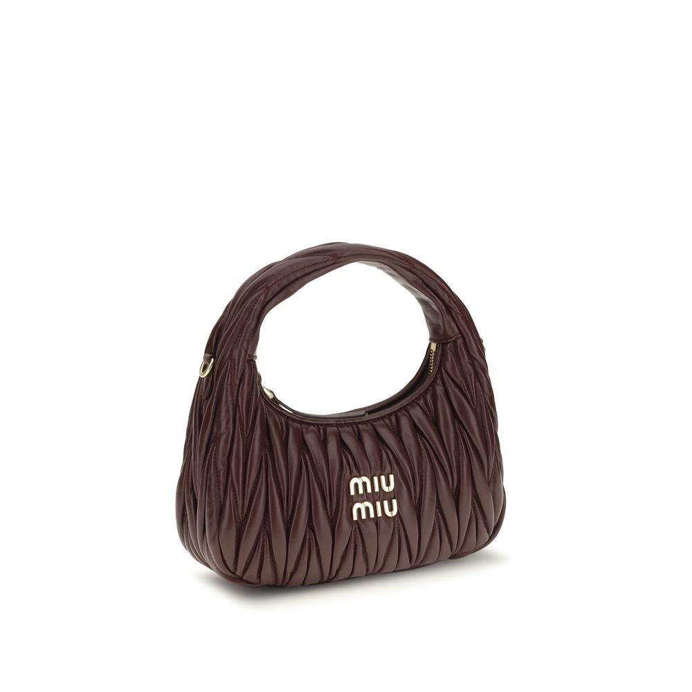 Elevate your style with the Miu Miu Bordeaux Calf Leather Bos Taurus Shoulder Bag, a masterpiece of exquisite craftsmanship and timeless elegance, perfect for any discerning connoisseur.