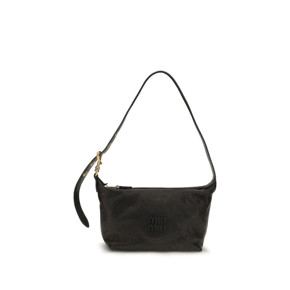 Discover the Miu Miu Black Suede Leather Shoulder Bag, a masterpiece of craftsmanship and elegance, perfect for those who embody sophistication and style.