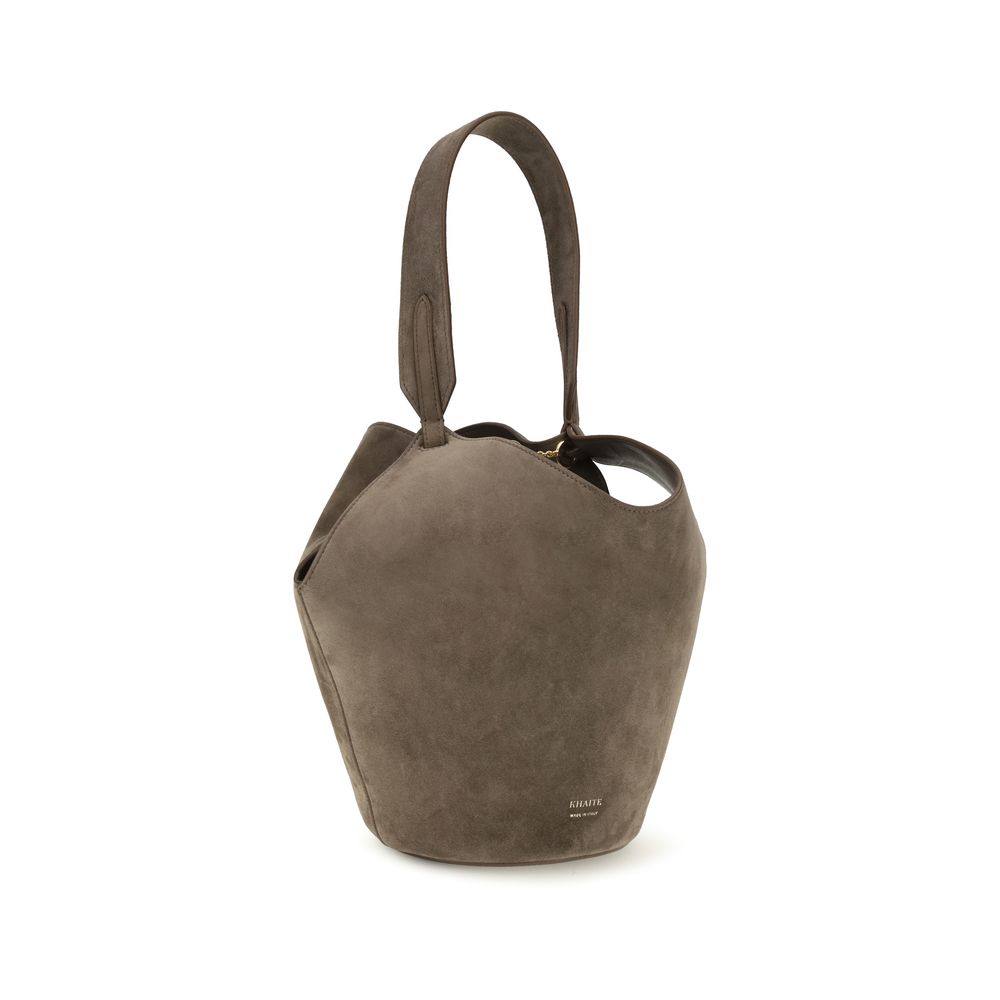 Indulge in the Khaite Brown Calf Leather Bos Taurus Shoulder Bag, a masterpiece of exquisite craftsmanship and luxurious suede, perfect for the discerning individual.