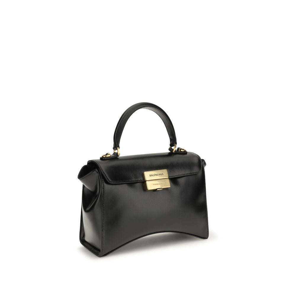 Elevate your style with the Balenciaga Black Calf Leather Bos Taurus Shoulder Bag, a timeless masterpiece of Italian craftsmanship that embodies luxury and sophistication.