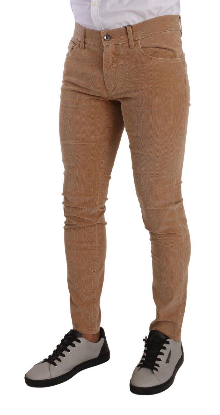 Indulge in the luxurious allure of Dolce & Gabbana's Brown Corduroy Cotton Skinny Slim Fit Jeans, where exquisite craftsmanship meets sophisticated style for the discerning individual.