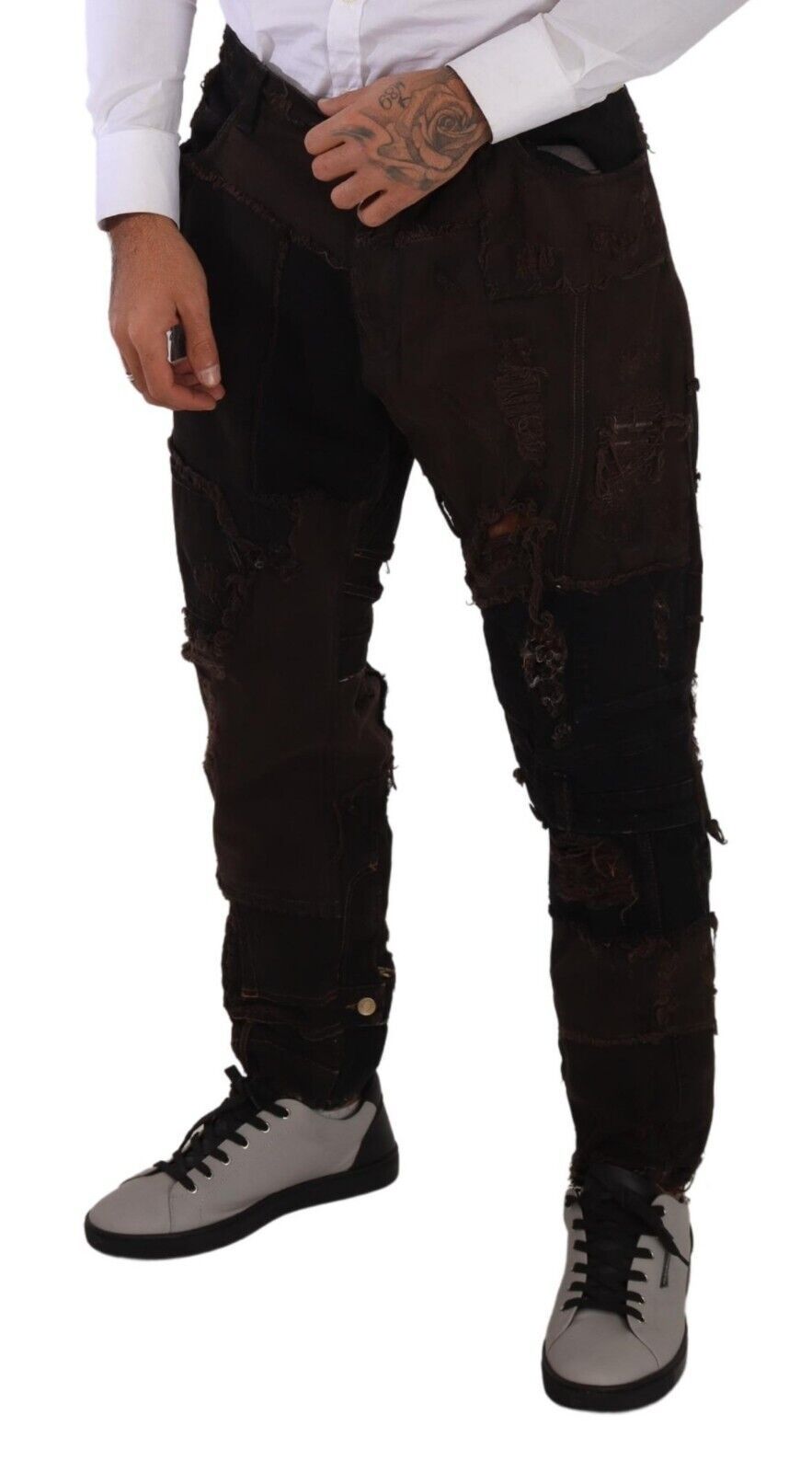 Elevate your wardrobe with Dolce & Gabbana's Brown Cotton Distressed Denim Jeans, where exquisite craftsmanship meets luxurious comfort for a timeless statement.