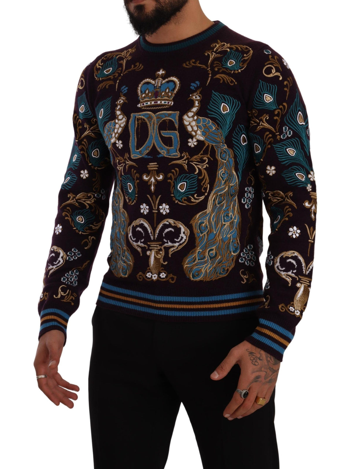 Indulge in the exquisite Dolce & Gabbana Bordeaux Cashmere DG Crown Embroidered Sweater, a timeless symbol of luxury and superior craftsmanship, perfect for the discerning individual.