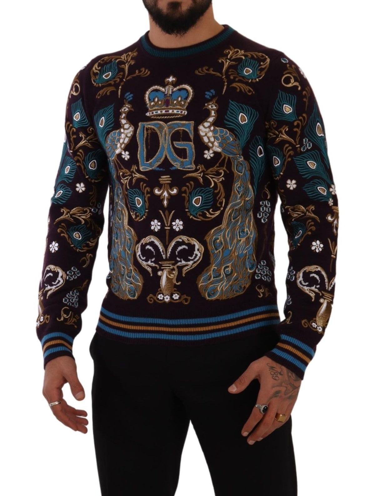 Indulge in the exquisite Dolce & Gabbana Bordeaux Cashmere DG Crown Embroidered Sweater, a symbol of superior craftsmanship and timeless elegance, perfect for the discerning individual.