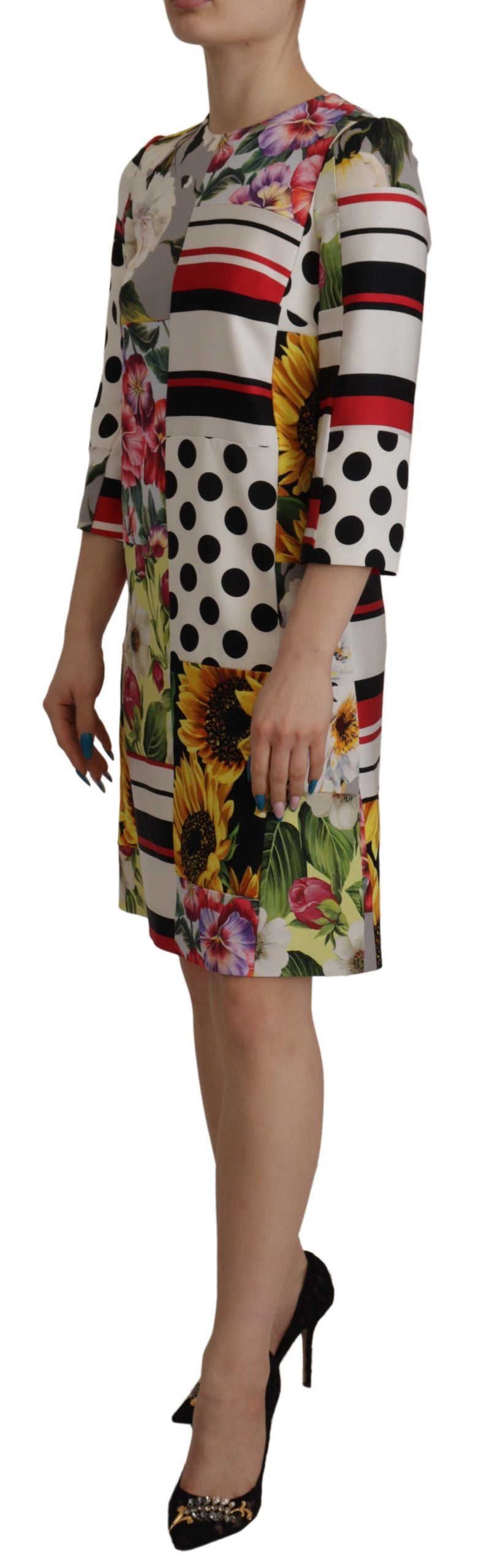 Elevate your wardrobe with the Dolce & Gabbana Multicolor Charmeuse Floral Sheath Dress, a luxurious patchwork masterpiece that embodies timeless elegance and sophisticated allure.