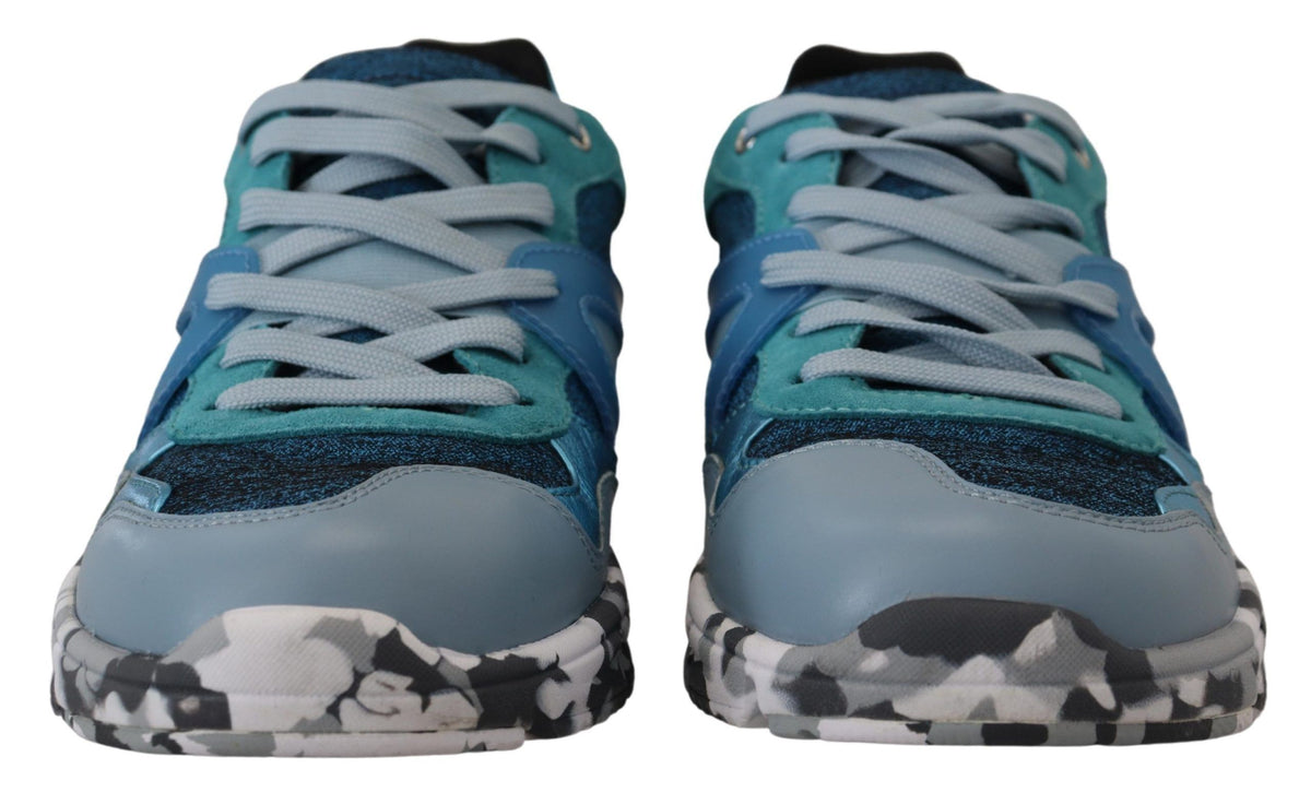 Indulge in the exquisite Dolce & Gabbana Blue Gray Leather Sport Low Top Sneakers, where Italian craftsmanship meets luxurious materials for unparalleled elegance and style.