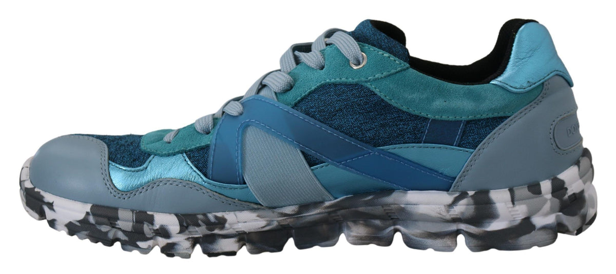 Indulge in the exquisite Dolce & Gabbana Blue Gray Leather Sport Low Top Sneakers, handcrafted in Italy from luxurious materials, embodying timeless elegance and sophisticated style.
