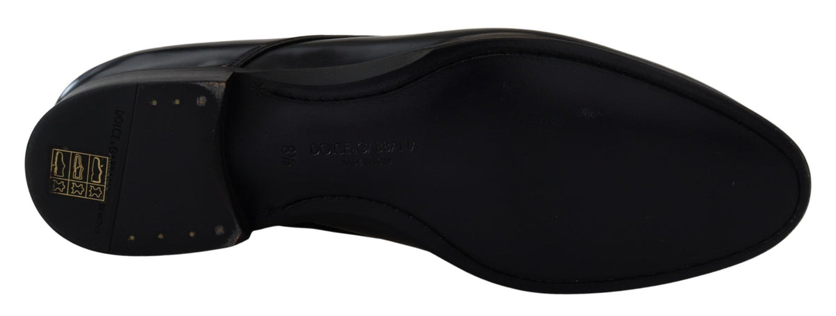 Step into refined elegance with Dolce & Gabbana's Black Leather Formal Dress Shoes, crafted from genuine leather for timeless sophistication and unparalleled comfort.