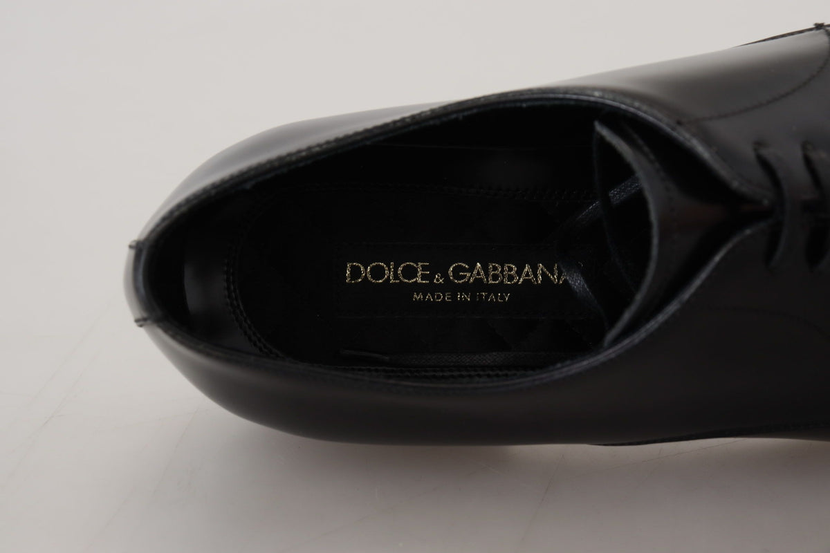 Experience the exquisite craftsmanship of Dolce & Gabbana's Black Leather Formal Dress Shoes, where timeless elegance meets luxurious comfort for the discerning modern gentleman.