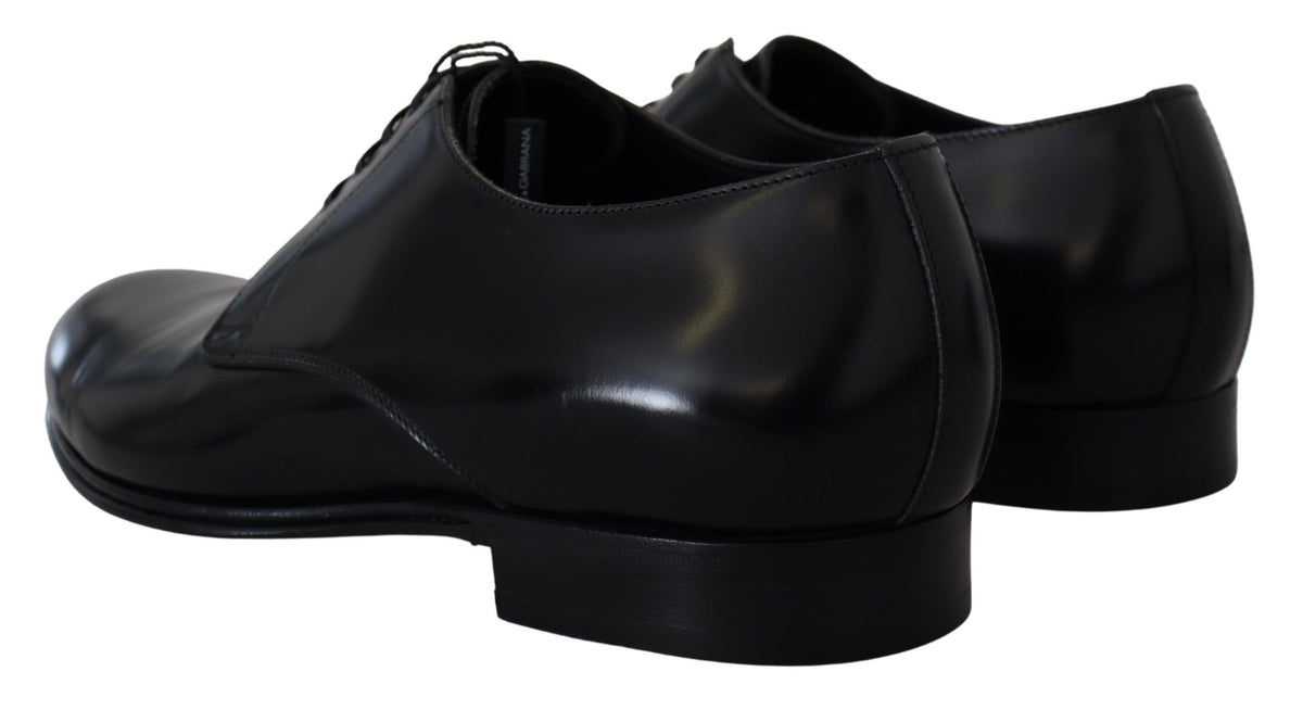 Experience the exquisite craftsmanship of Dolce & Gabbana's Black Leather Formal Dress Shoes, where timeless elegance meets luxurious comfort for the discerning individual.