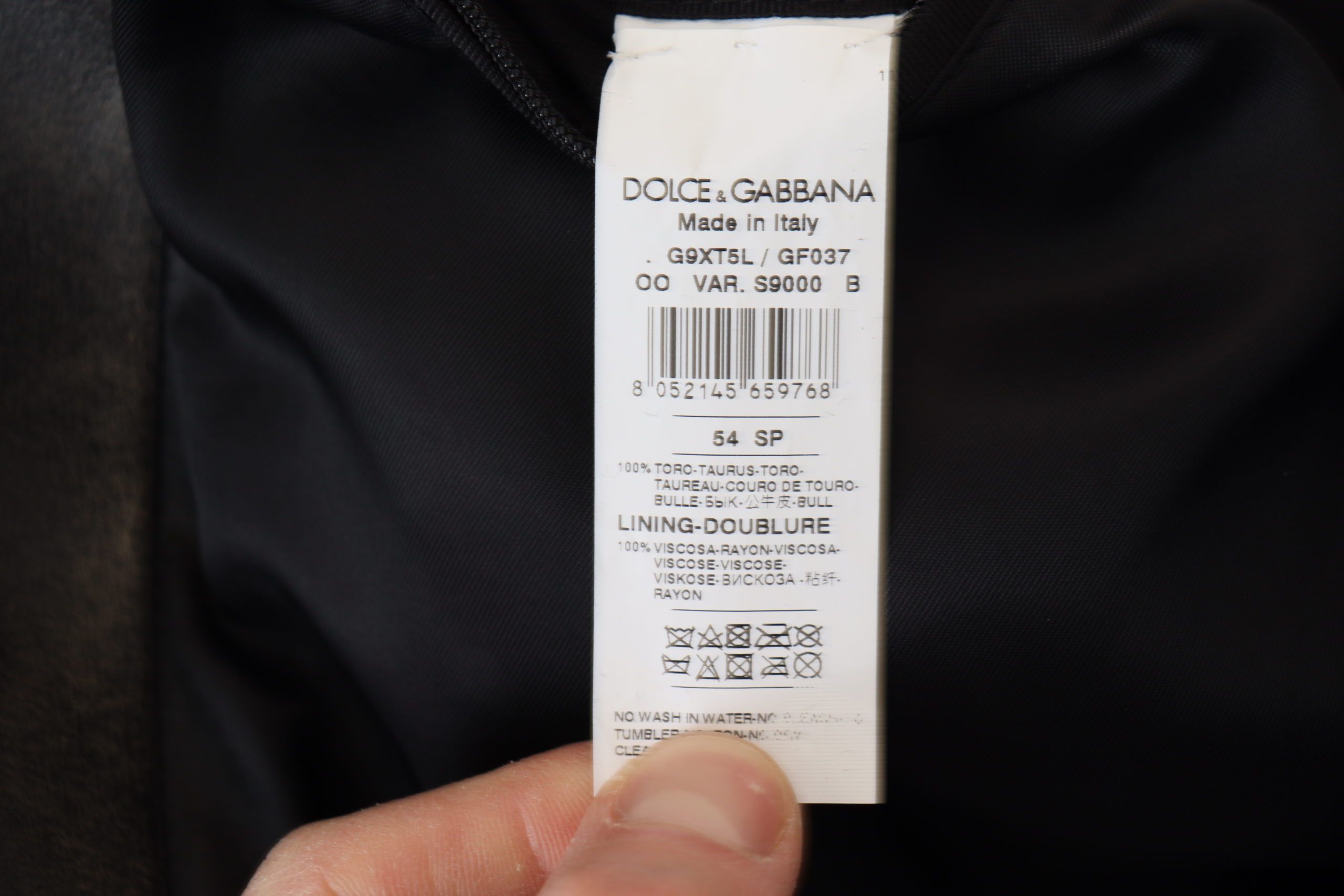 Indulge in the exquisite Dolce & Gabbana Black Leather Zipper Biker Coat Jacket, a luxurious statement piece crafted from fine leather, embodying sophistication and timeless elegance.