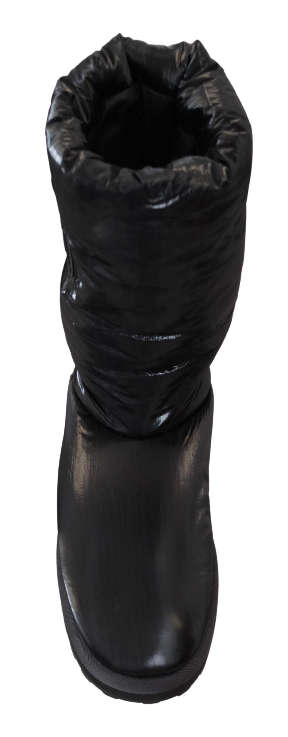 Elevate your winter wardrobe with Dolce & Gabbana Black Boots, crafted from luxurious polyester in Italy, embodying sophistication and timeless elegance for discerning tastes.