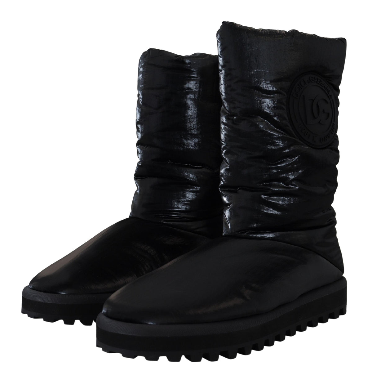 Elevate your winter wardrobe with Dolce & Gabbana Black Boots, crafted from luxurious polyester, embodying sophistication and Italian craftsmanship for the discerning individual.