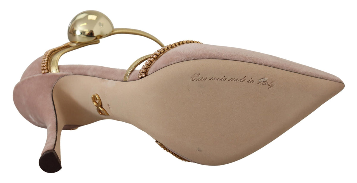 Indulge in the allure of Dolce & Gabbana's Pink Crystal T-strap Heels, where exquisite pink satin meets dazzling craftsmanship, perfect for elevating any ensemble.