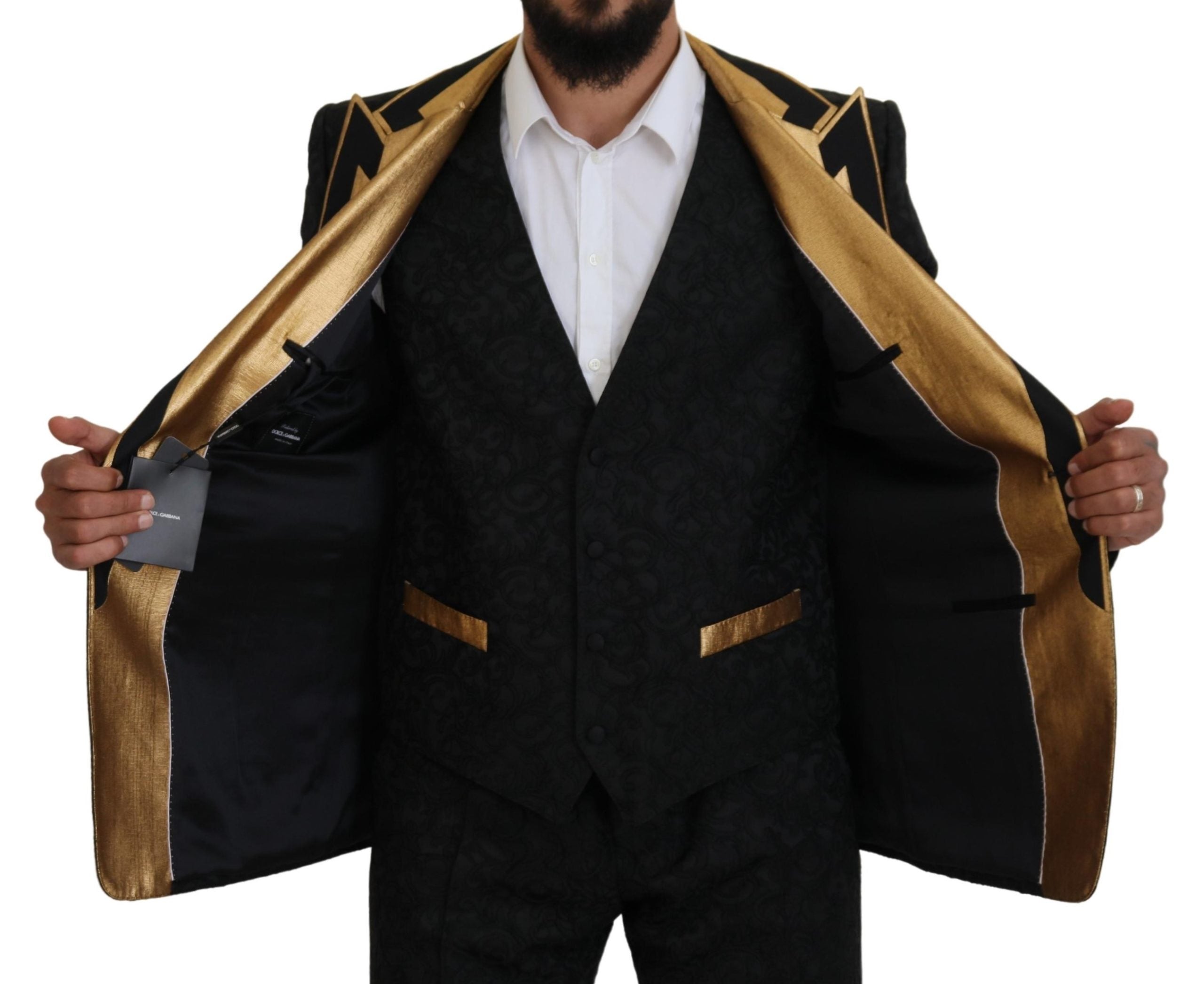 Discover the Dolce & Gabbana Black Gold Fantasy Tuxedo Slim Fit Suit, a masterful blend of silk and acetate, embodying timeless elegance and modern sophistication.