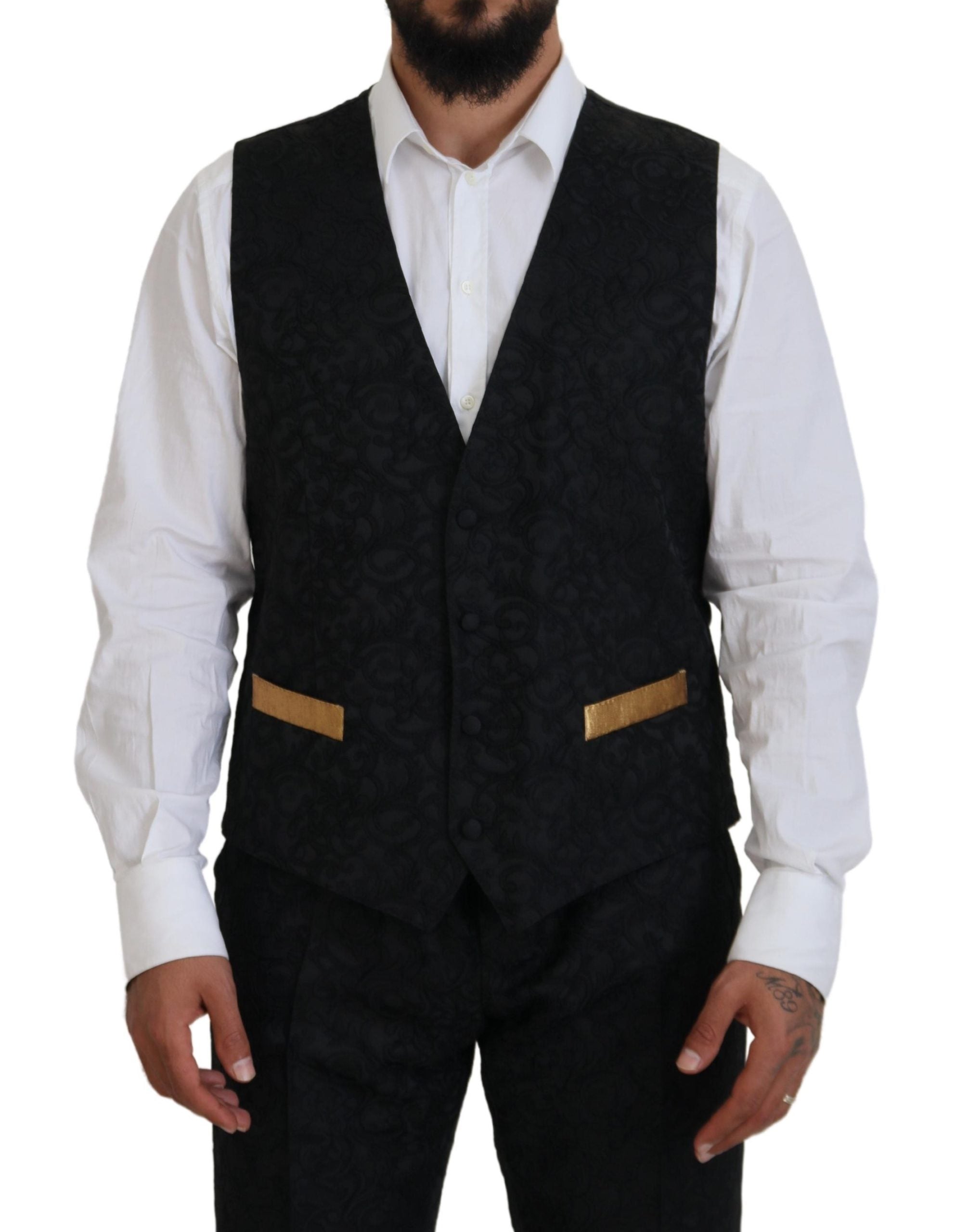 Elevate your elegance with the Dolce & Gabbana Black Gold Fantasy Tuxedo Slim Fit Suit, a masterpiece of exquisite craftsmanship and luxurious materials, designed for the discerning individual.