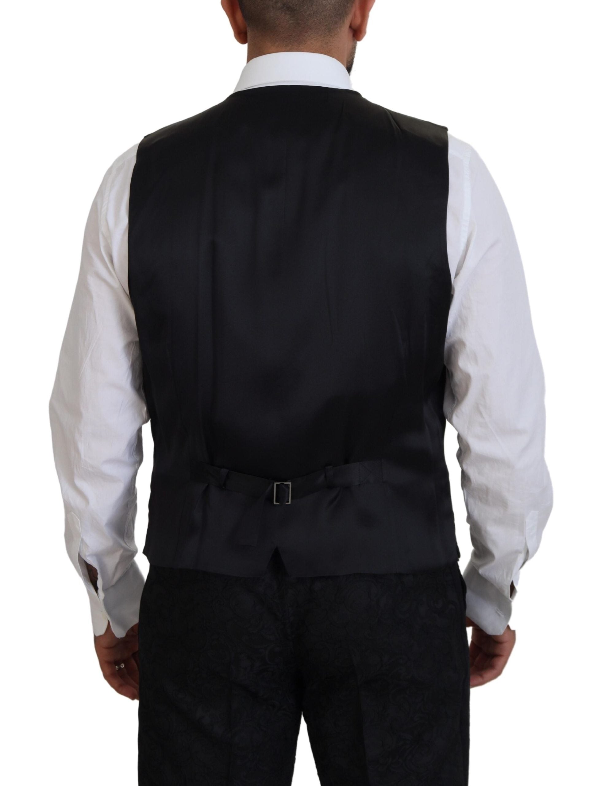 Experience the allure of the Dolce & Gabbana Black Gold Fantasy Tuxedo Slim Fit Suit, a masterful blend of silk and acetate, embodying exquisite Italian craftsmanship for the discerning individual.