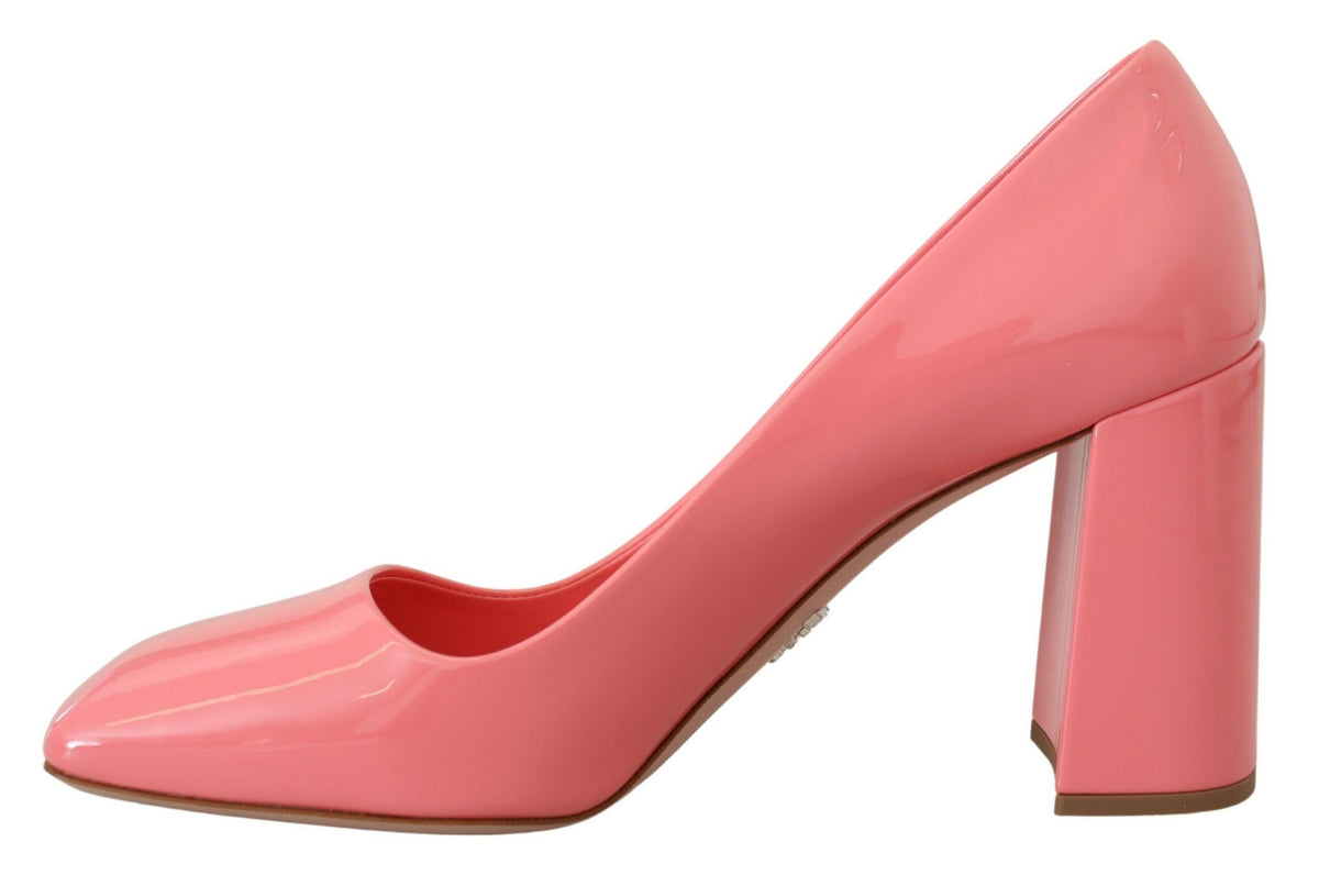 Elevate your style with Prada Pink Patent Leather Block Heels, a timeless blend of luxury and artisan craftsmanship, designed for the discerning individual.