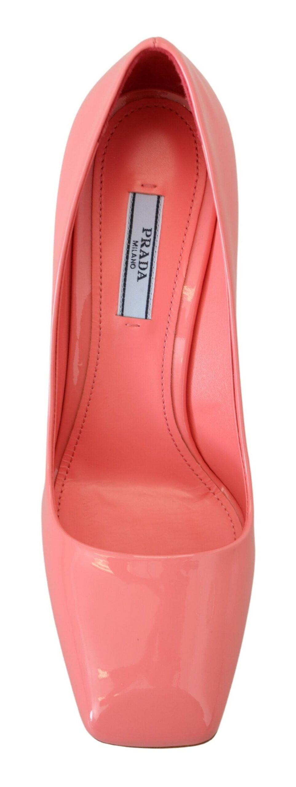Experience the allure of Prada Pink Patent Leather Block Heels, a timeless masterpiece crafted in Italy, embodying elegance and sophistication for the discerning individual.