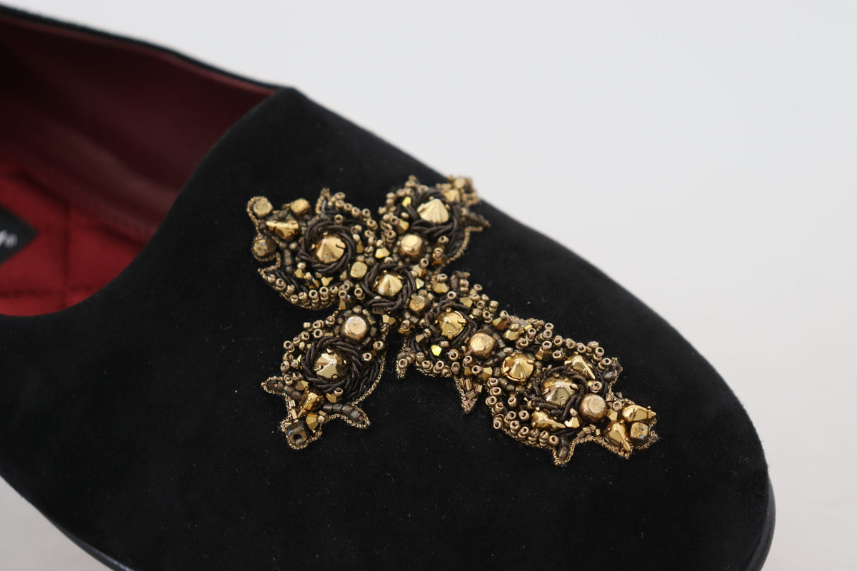 Elevate your style with Dolce & Gabbana's Black Suede Gold Cross Slip On Loafers, where exquisite craftsmanship meets luxurious comfort for the discerning individual.