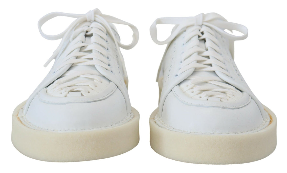 Elevate your style with Dolce & Gabbana's White Leather Low Top Oxford Sneakers, crafted in Italy from premium leather for unparalleled luxury and comfort.