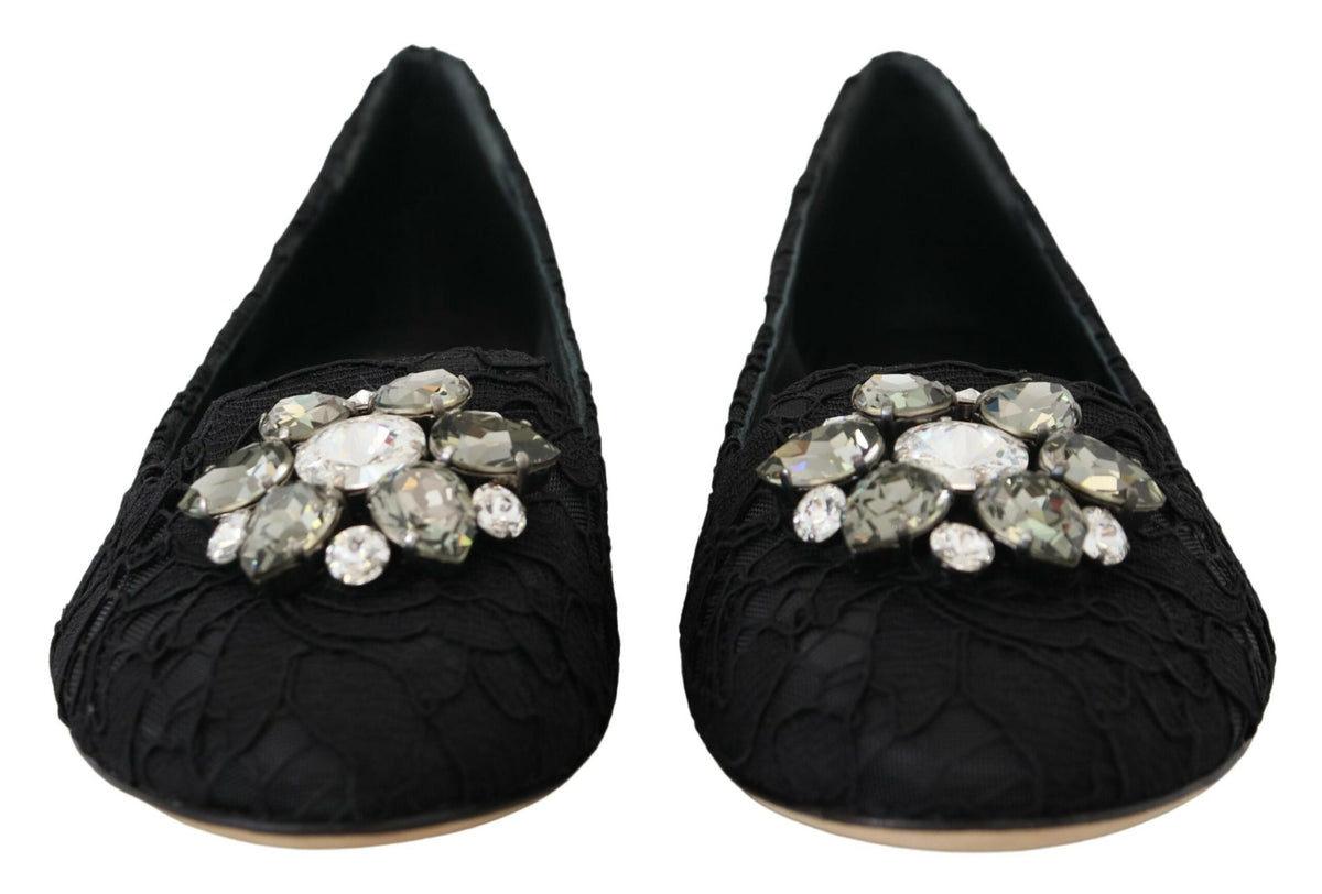 Indulge in the exquisite elegance of Dolce & Gabbana's Black Taormina Lace Crystals Flats, where artisanal craftsmanship meets timeless sophistication for the discerning individual.