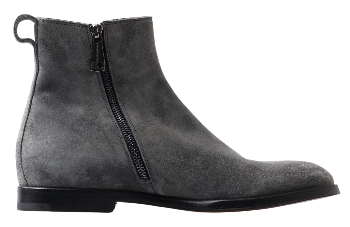 Step into sophistication with Dolce & Gabbana Gray Leather Men Ankle Boots, handcrafted in Italy from genuine leather, epitomizing luxury and timeless elegance.