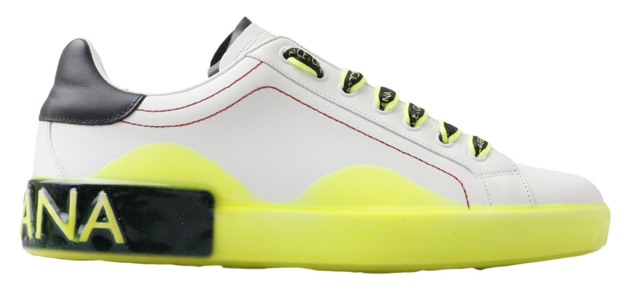 Elevate your style with Dolce & Gabbana's White Yellow Portofino Leather Sneakers, where exquisite craftsmanship meets luxurious design for the discerning individual.