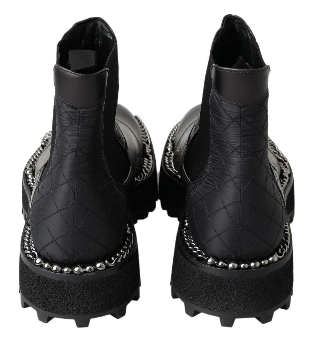 Indulge in the exquisite Dolce & Gabbana Black Leather Slip on Stretch Boots, handcrafted in Italy for a timeless elegance that elevates every ensemble.