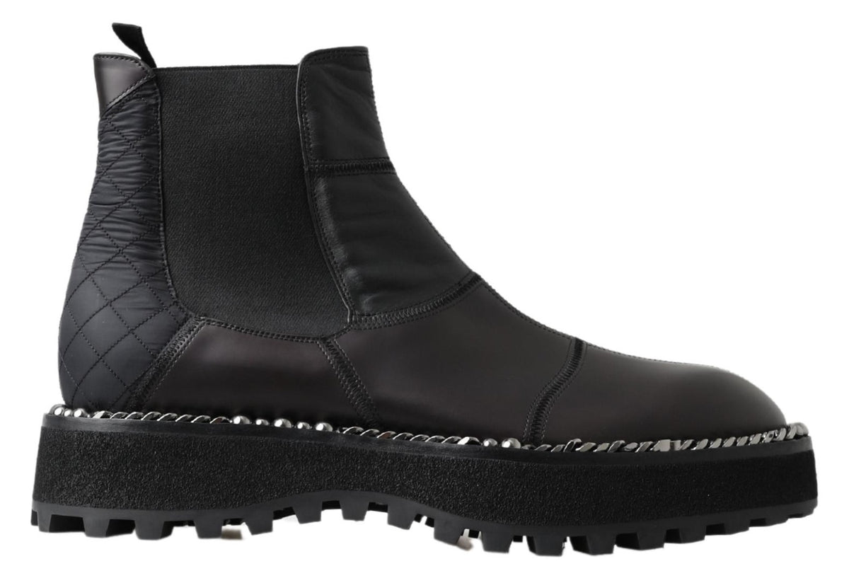 Indulge in the exquisite Dolce & Gabbana Black Leather Slip on Stretch Boots, a masterpiece of Italian craftsmanship that elevates your style with luxurious comfort and timeless elegance.