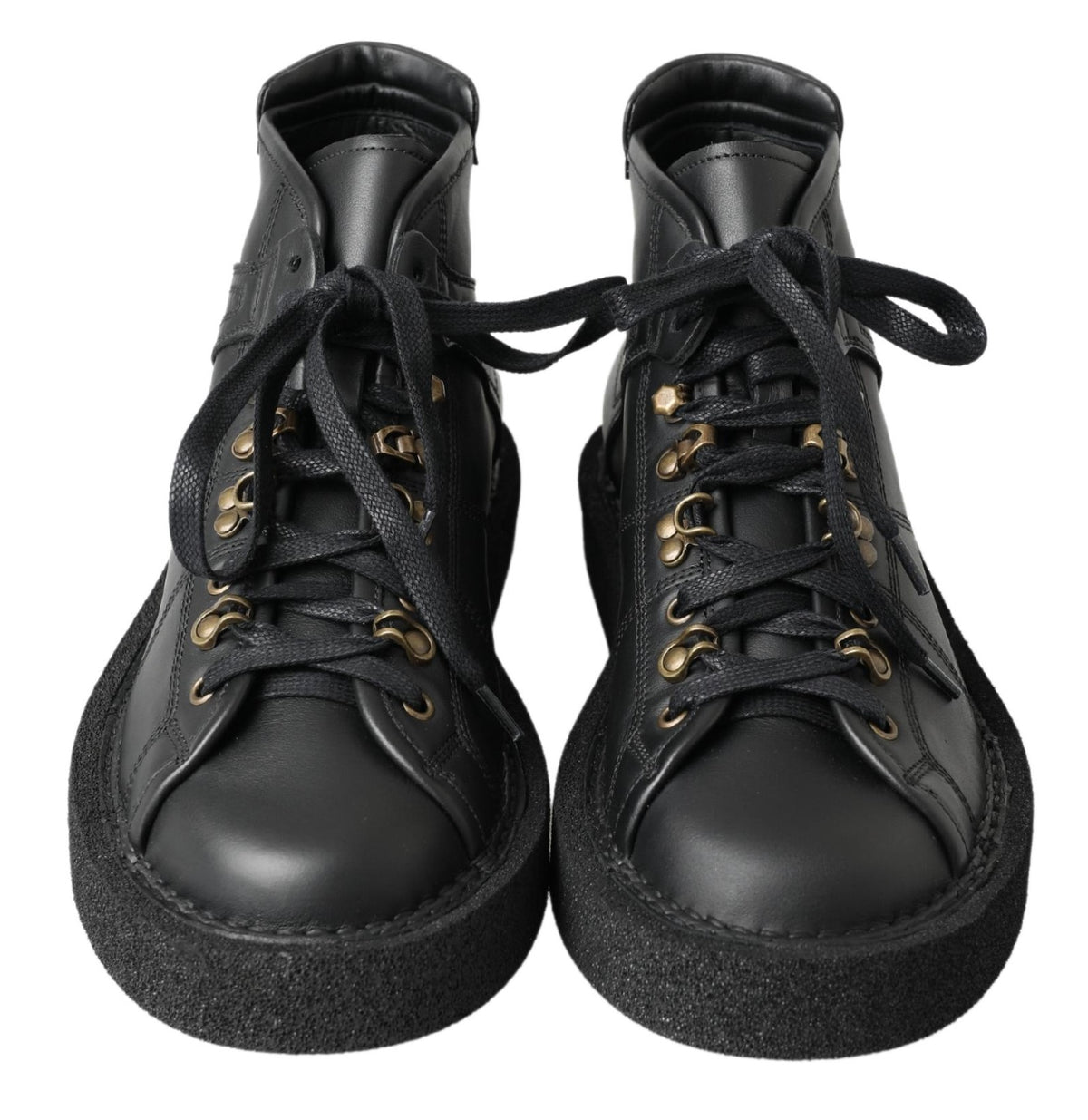 Step into sophistication with Dolce & Gabbana's Black Leather Slip-on Stretch Boots, where exquisite craftsmanship meets timeless elegance for the discerning individual.