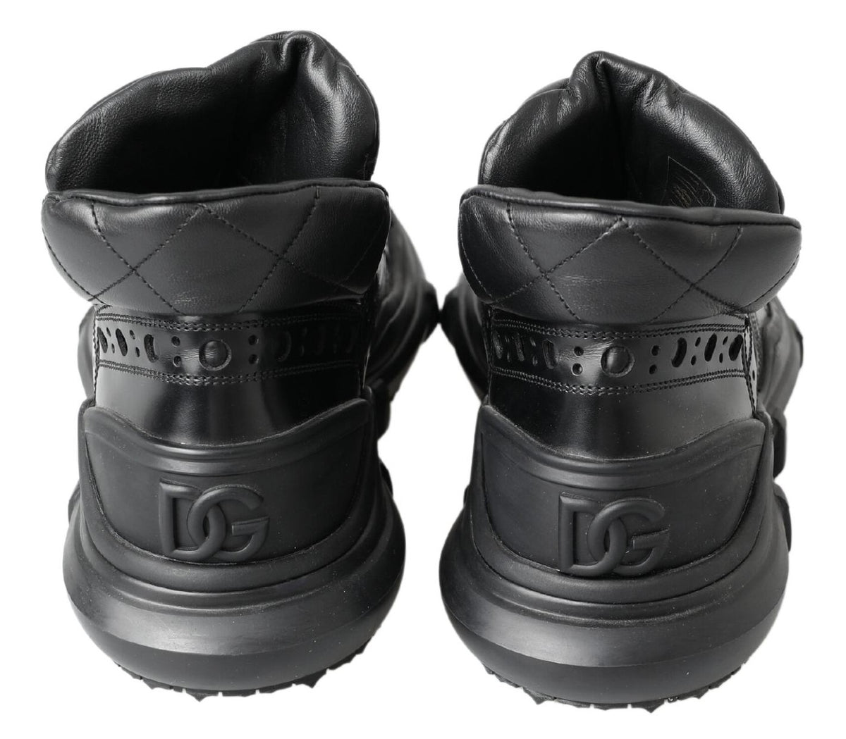 Step into a realm of elegance with Dolce & Gabbana Black Leather Ankle Casual Boots, crafted in Italy from sumptuous leather, embodying timeless sophistication and artisanal mastery.