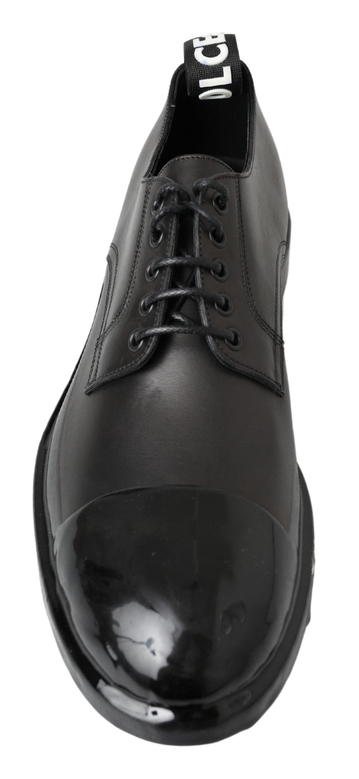 Elevate your style with Dolce & Gabbana's Black Leather Derby Dress Shoes, where exquisite craftsmanship meets timeless luxury for the discerning individual.