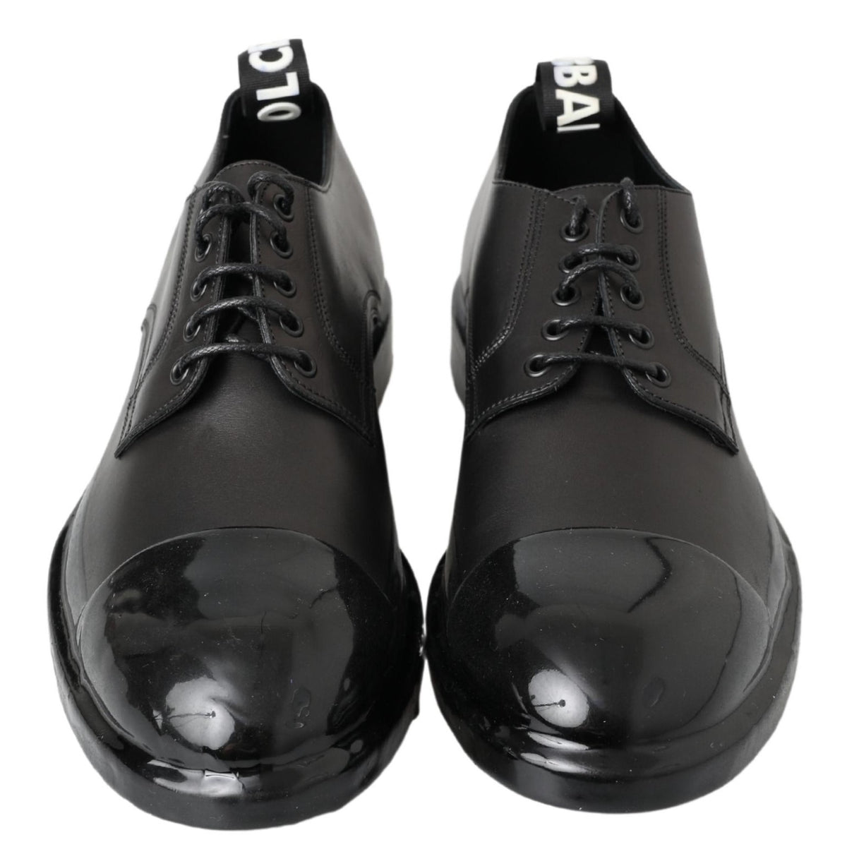 Discover the exquisite Dolce & Gabbana Black Leather Derby Dress Shoes, where artisanal craftsmanship meets timeless elegance for the discerning individual.