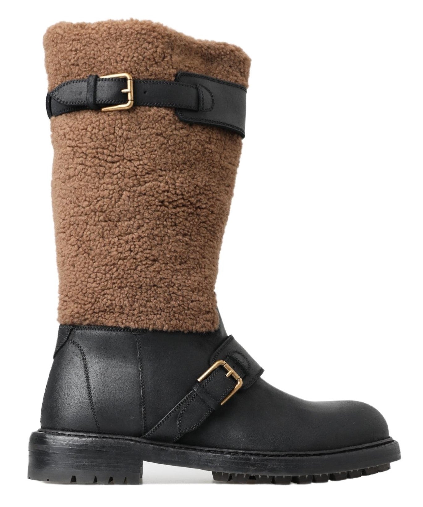Indulge in the exquisite Dolce & Gabbana Black Leather Brown Shearling Boots, where luxurious craftsmanship meets timeless elegance for the discerning individual.